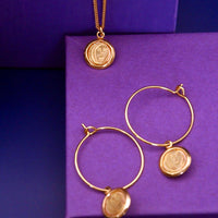 Collier long médaillon Eve